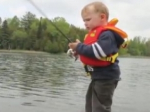 A little boy… try to fish! It is very funny…