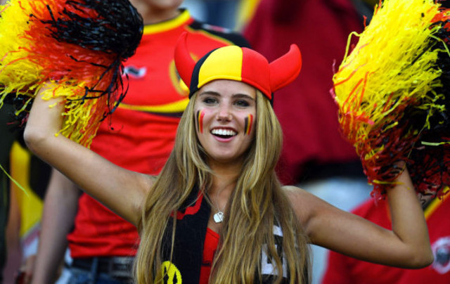 HOT : Belgium Fan given modelling contract after being spotted in the World Cup .