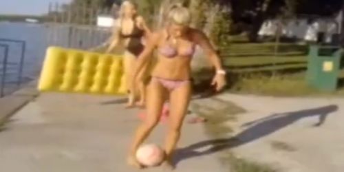 A blonde doing football tricks!
