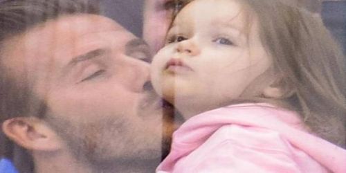 Cute! David Beckham kisses daughter Harper