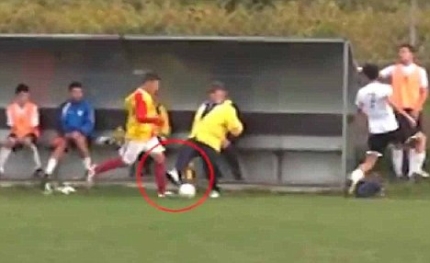 Crazy stuff! Coach trips up opposition player!