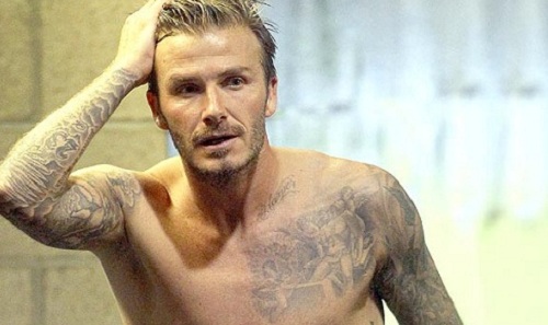 David Beckham is talking half naked…with a blonde from the stands!