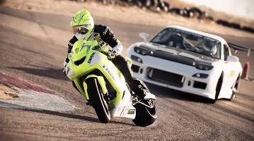 The strangest battle: Motorcycle vs. Car!