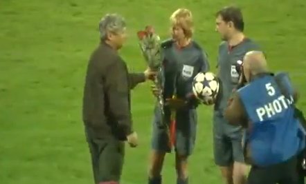 Coach gives female referee flowers and a kiss!