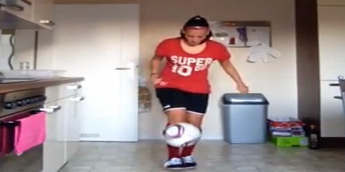 Sofia plays football in her kitchen!