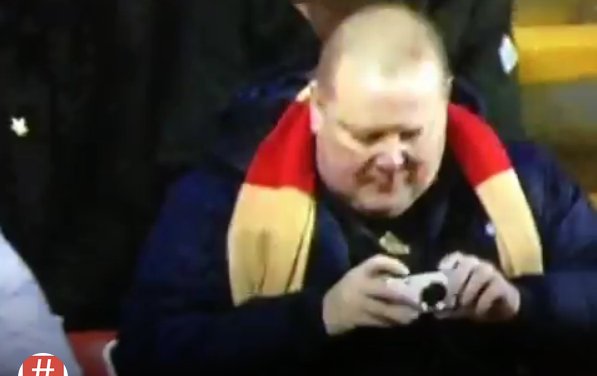 Liverpool fan takes a pic of a Villa player after he falls down! [Vine]