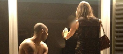 What is Kobe doing with two girls naked?