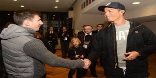 Messi laughing with Ronaldo!