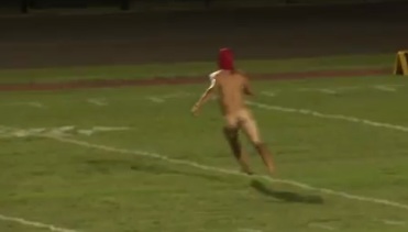 Naked wacko…makes the crowd go wild and escapes in style!