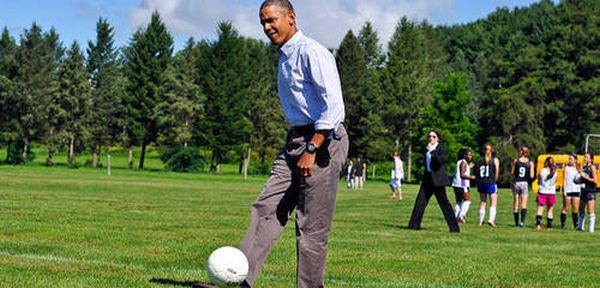 President Obama shows off his football skills