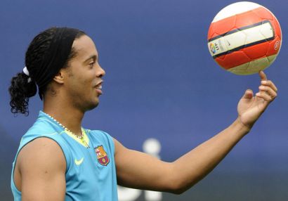 Ronaldinho has been trying to teach football to a dumb reporter.  You know what happened?