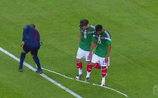 Fail: Referee sprays Mexican players boots! [video]